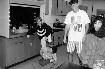 Jacob Meyer standing on my head in Chemistry Class in 10th grade